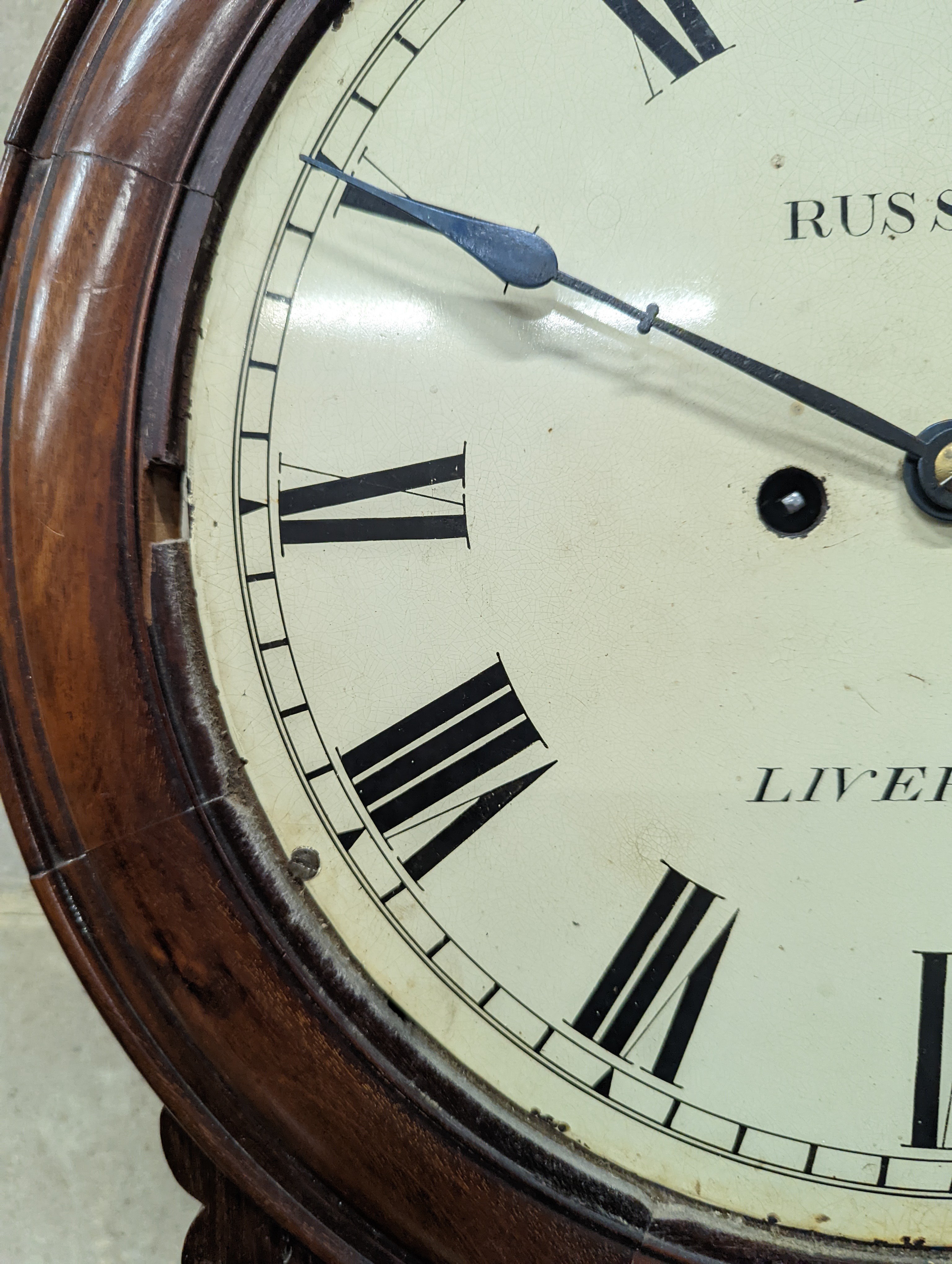 A Victorian mahogany drop dial wall clock, with twin fusee movement, and circular white painted Roman dial signed 